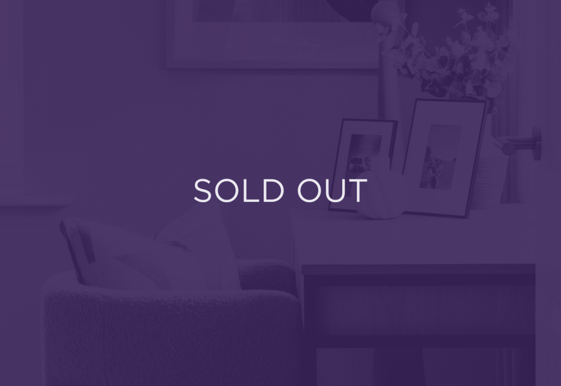 an image of a living room, with a purple overlay and text that says sold out