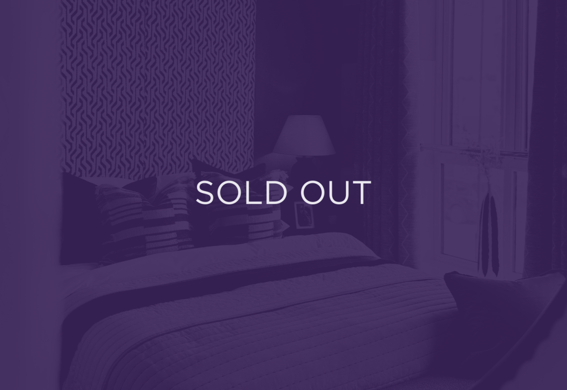 an image of a bed, with a purple overlay and text that says sold out