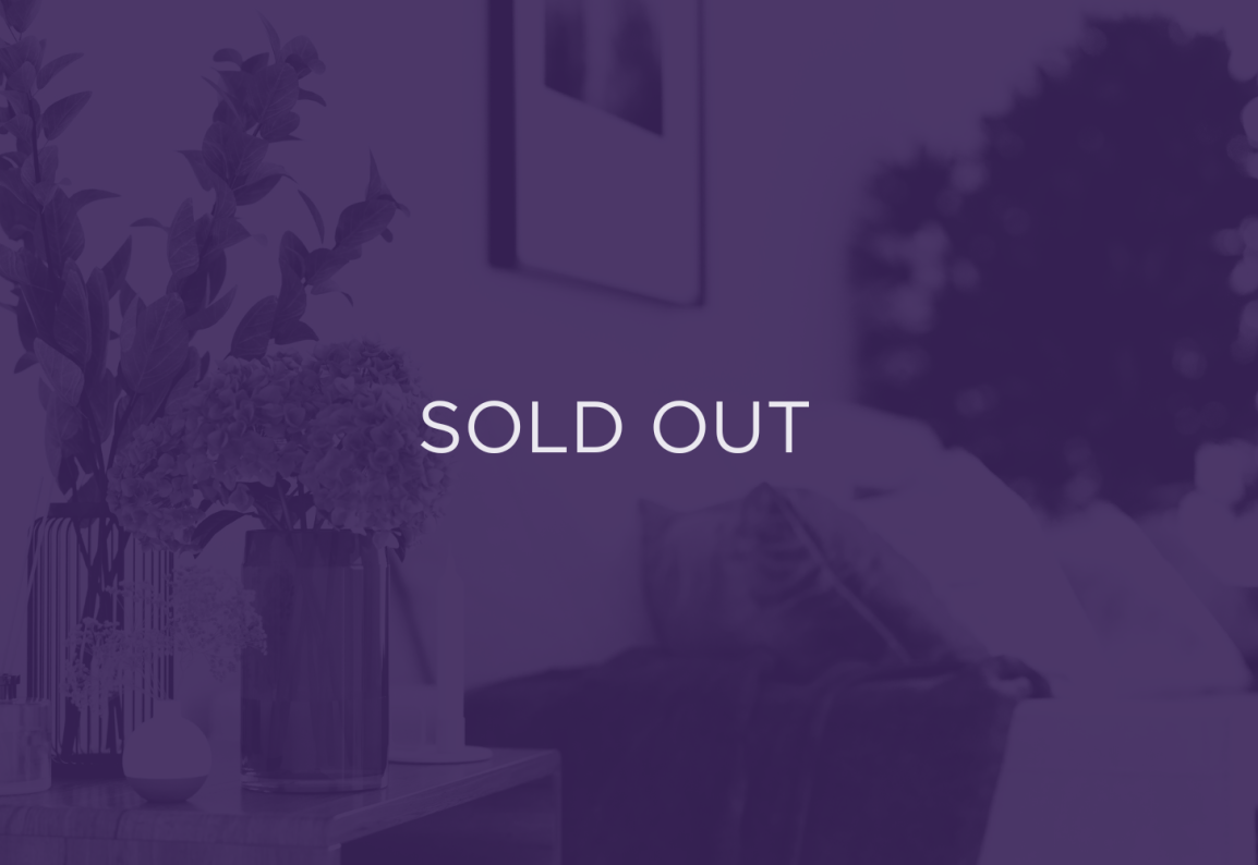 an image of a living room, with a purple overlay and text that says sold out
