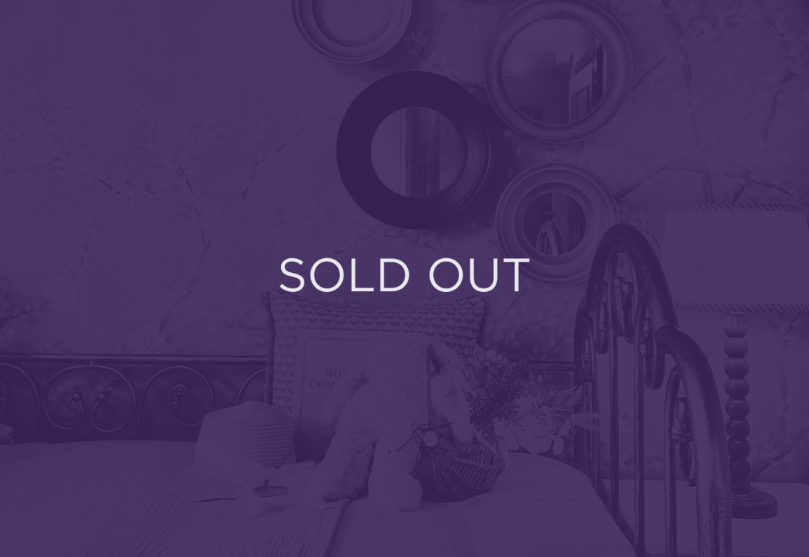 an image of decoration, with purple overlay and text that says sold out