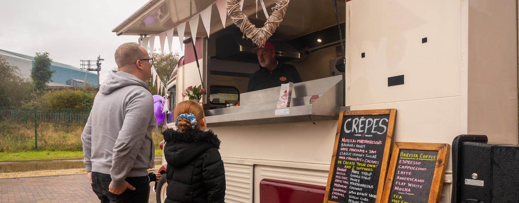 Customers being served at crepe stall at Brindley Meadows show home open event