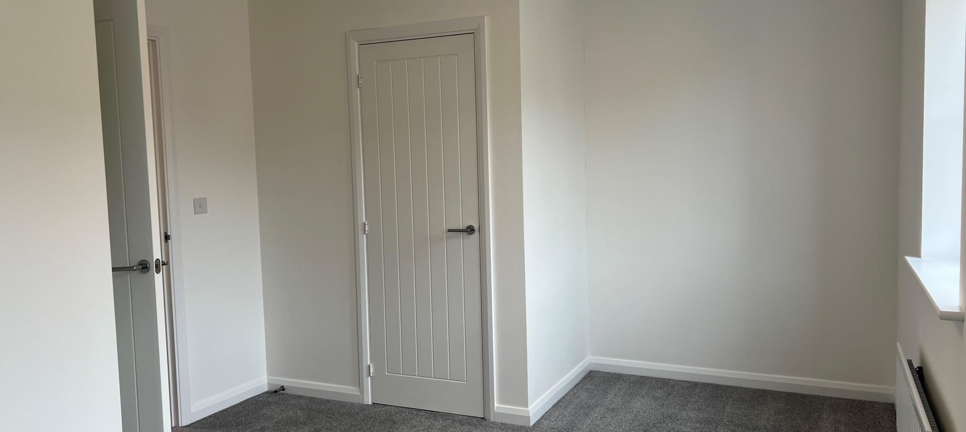 Bedroom Two with Storage Cupboard at The Holly