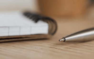 Notebook and pen