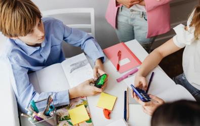 Anonymous Children Working Together as a Team on a Project