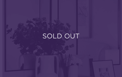 an image of a decorative plant, with a purple overlay and text that says sold out
