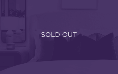 image of some cushions, with a purple overlay and text that says sold out