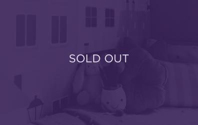 an image of some cuddly toys in a nursery, with a purple overlay and text that says sold out