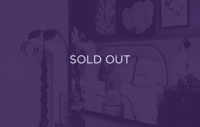 an image of a bedroom, with a purple overlay and text that says sold out