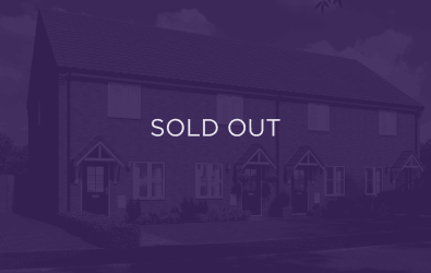 an image of a home in Tudor Reach, purple overlay with text that says sold out