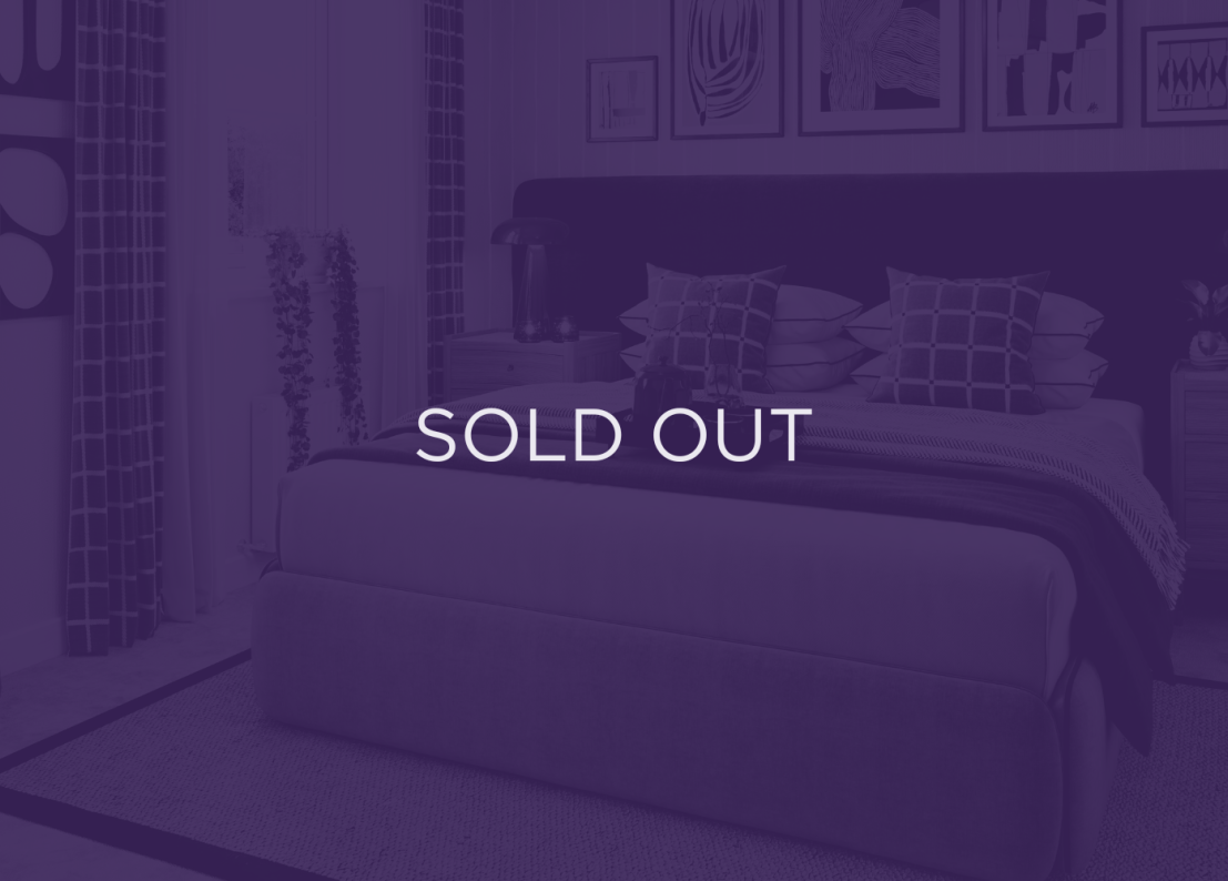 an image of a bedroom, with a purple overlay and text that says sold out
